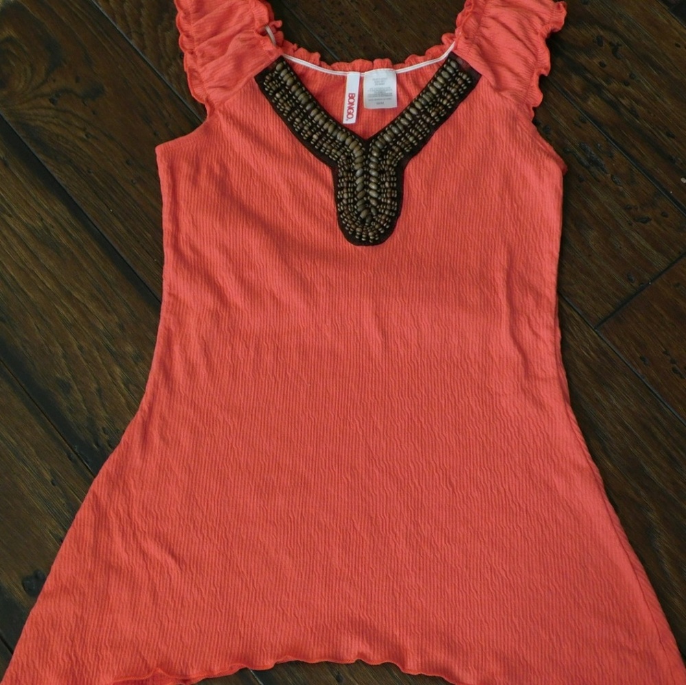 A cute Bongo top with beading along Ne